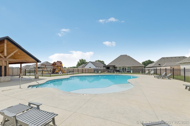 22832 E 106th Pl S, Broken Arrow, OK 74014 - community pool with a patio and a fenced backyard