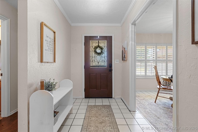 2003 8th NW, Ardmore, OK 73401 - entryway featuring ornamental molding, a textured wall, light tile patterned floors, and baseboards