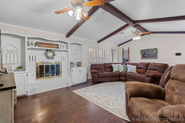 2003 8th NW, Ardmore, OK 73401 - living area featuring ceiling fan, dark wood finished floors, and a fireplace