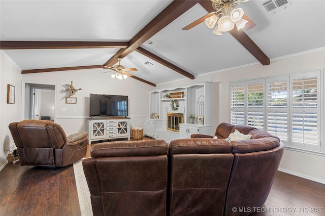 2003 8th NW, Ardmore, OK 73401 - living area featuring a ceiling fan, dark wood-style flooring, and baseboards