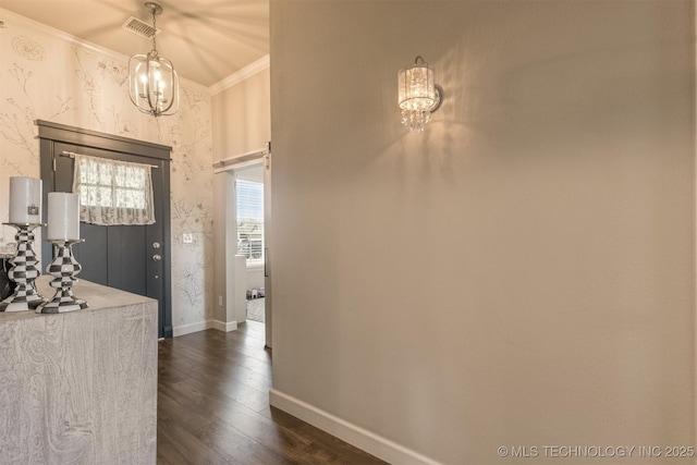 23107 E 104th Pl S, Broken Arrow, OK 74014 - corridor with a chandelier, crown molding, dark wood-type flooring, baseboards, and wallpapered walls