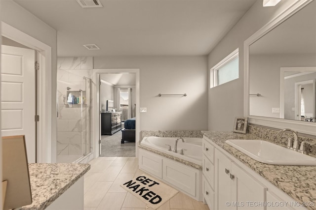 23107 E 104th Pl S, Broken Arrow, OK 74014 - ensuite bathroom featuring a shower stall, vanity, and a bath