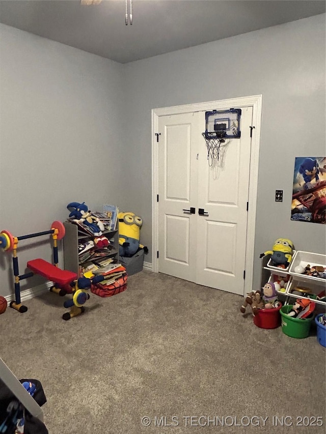 128 Crimson Ln, Calera, OK 74730 - recreation room featuring carpet floors and baseboards