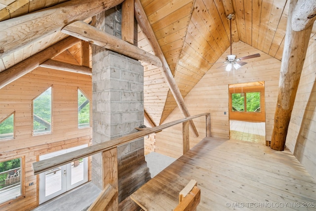 21745 E 660th Rd, Tahlequah, OK 74464 - hallway featuring wooden walls, an upstairs landing, healthy amount of natural light, wood ceiling, and hardwood / wood-style flooring