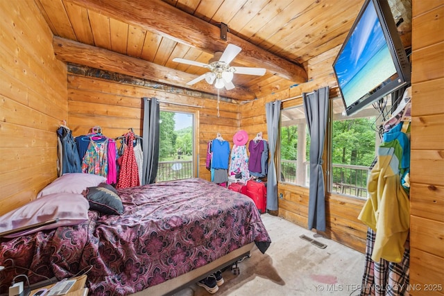 21745 E 660th Rd, Tahlequah, OK 74464 - carpeted bedroom featuring access to exterior, wooden walls, and wood ceiling with exposed beams