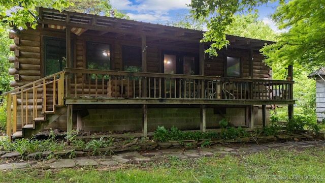 21745 E 660th Rd, Tahlequah, OK 74464 - back of property with log siding and a deck