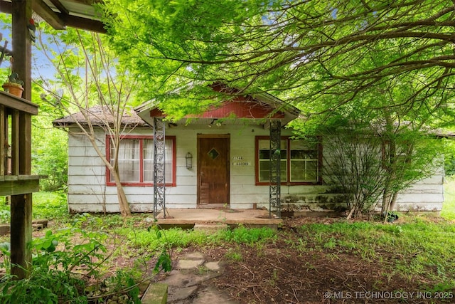 21745 E 660th Rd, Tahlequah, OK 74464 - view of front facade featuring covered porch