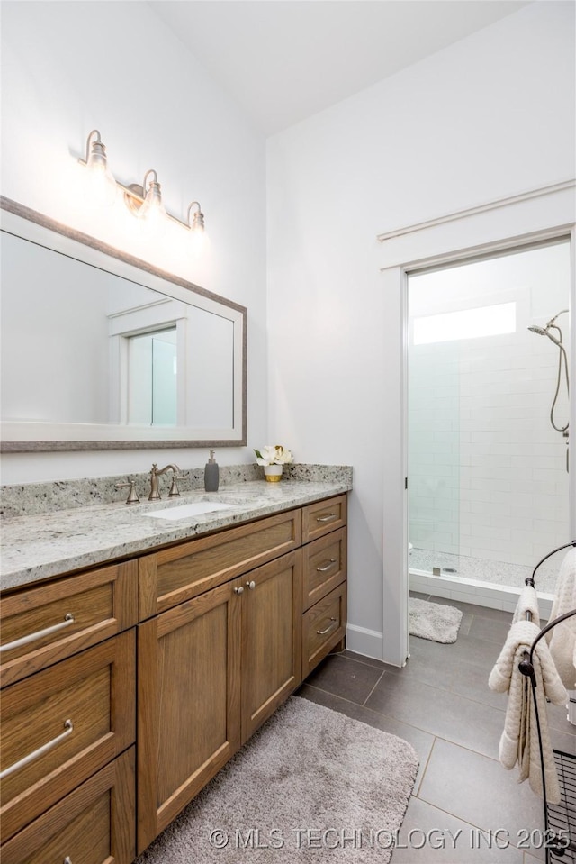 46 Red Cedar Cir, Durant, OK 74701 - full bathroom with vanity, a tile shower, and tile patterned floors