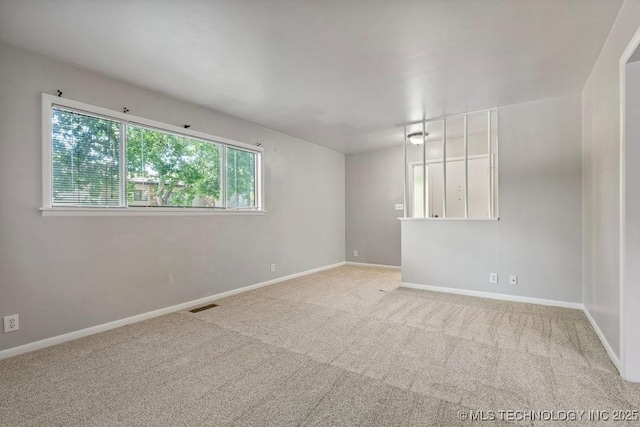 953 E 37th St, Tulsa, OK 74105 - spare room with carpet floors and baseboards