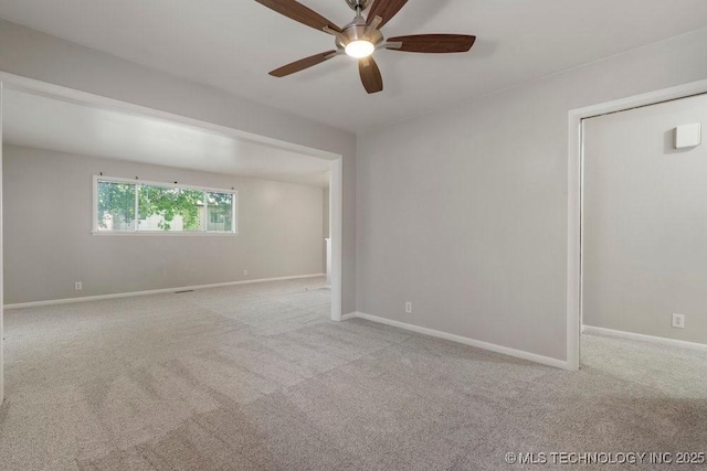 953 E 37th St, Tulsa, OK 74105 - empty room with a ceiling fan, carpet flooring, and baseboards