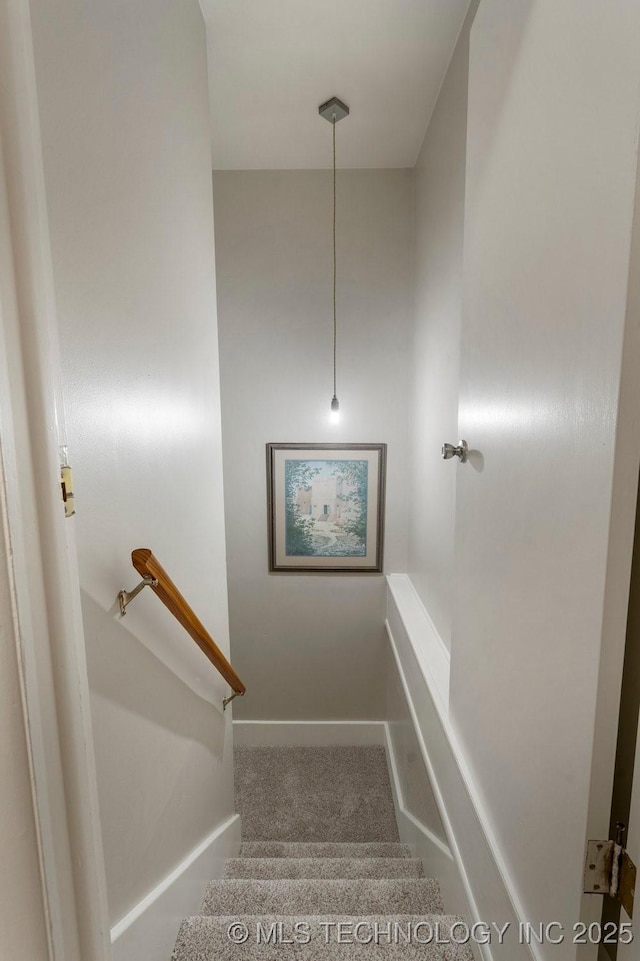 953 E 37th St, Tulsa, OK 74105 - stairway featuring carpet and baseboards