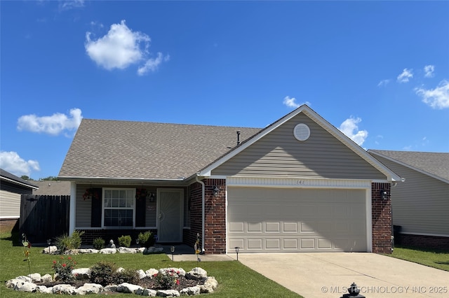 141 W Fairlane Pl, Sapulpa, OK 74066 - view of front of home featuring brick siding, a garage, driveway, and a shingled roof