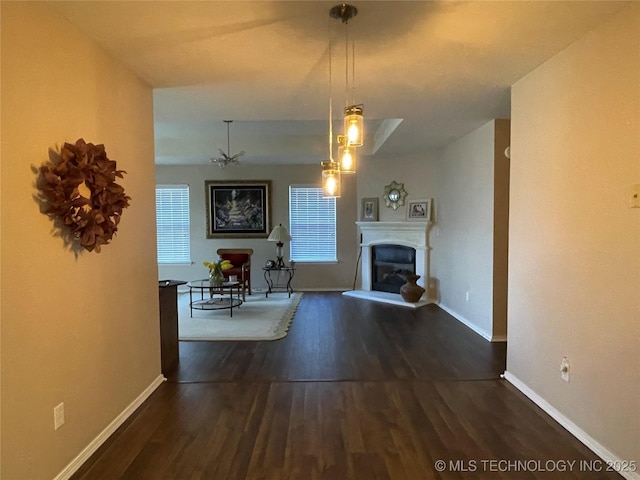 141 W Fairlane Pl, Sapulpa, OK 74066 - living room featuring wood finished floors, baseboards, and a fireplace