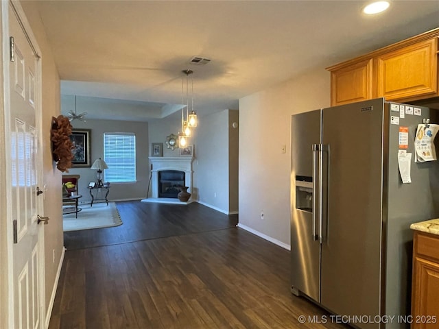 141 W Fairlane Pl, Sapulpa, OK 74066 - kitchen featuring stainless steel fridge, baseboards, a fireplace, dark wood finished floors, and open floor plan