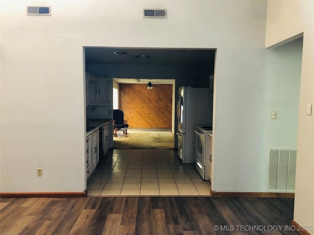3814 E Dripping Springs Rd, Cushing, OK 74023 - hallway featuring baseboards and wood finished floors