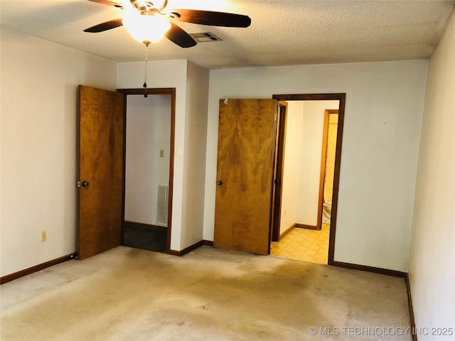 3814 E Dripping Springs Rd, Cushing, OK 74023 - unfurnished bedroom with baseboards, carpet flooring, and ceiling fan