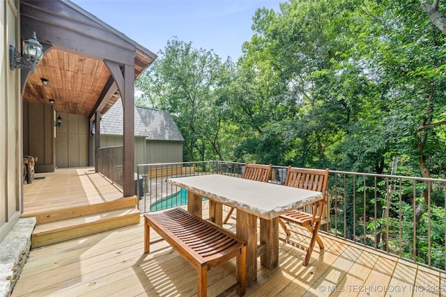 10144 N Dover Pl, Owasso, OK 74055 - deck featuring outdoor dining area and view of scattered trees