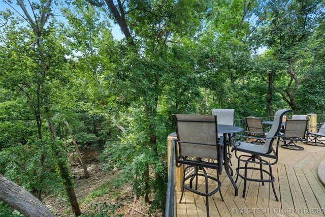 10144 N Dover Pl, Owasso, OK 74055 - wooden deck featuring outdoor dining space