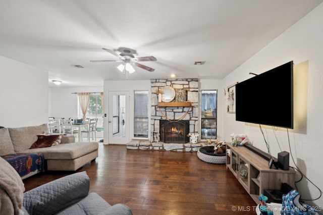 4509 W Toledo St, Broken Arrow, OK 74012 - living room with hardwood / wood-style floors, ceiling fan, and a stone fireplace