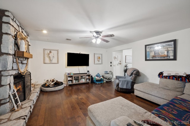 4509 W Toledo St, Broken Arrow, OK 74012 - living room with wood finished floors, a ceiling fan, and a fireplace