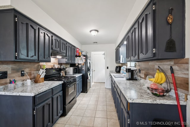 4509 W Toledo St, Broken Arrow, OK 74012 - kitchen featuring black appliances, under cabinet range hood, decorative backsplash, light countertops, and light tile patterned floors