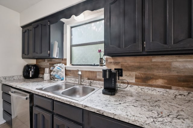 4509 W Toledo St, Broken Arrow, OK 74012 - kitchen featuring stainless steel dishwasher, tasteful backsplash, and light countertops