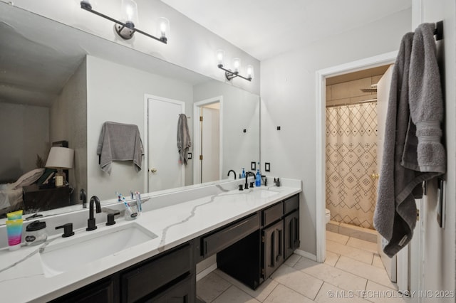 4509 W Toledo St, Broken Arrow, OK 74012 - full bathroom with double vanity, curtained shower, and tile patterned flooring