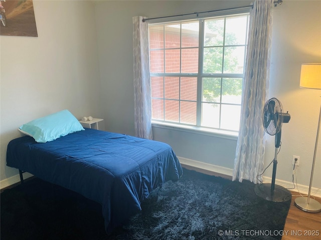 1816 W Sandusky St, Broken Arrow, OK 74012 - bedroom featuring wood finished floors and baseboards