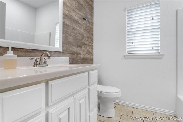 153 Founders Ln, Durant, OK 74701 - bathroom featuring vanity, toilet, tile patterned floors, and baseboards
