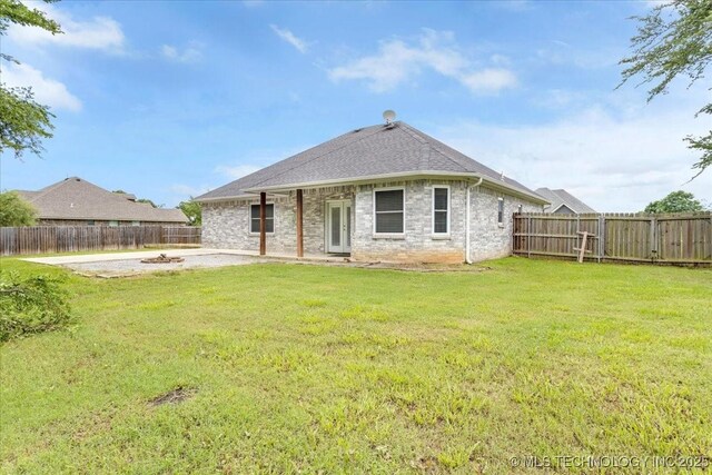 153 Founders Ln, Durant, OK 74701 - rear view of property featuring a patio and a shingled roof