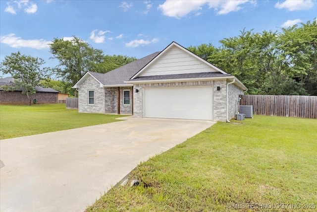 153 Founders Ln, Durant, OK 74701 - ranch-style home with driveway, central AC, a garage, a shingled roof, and brick siding