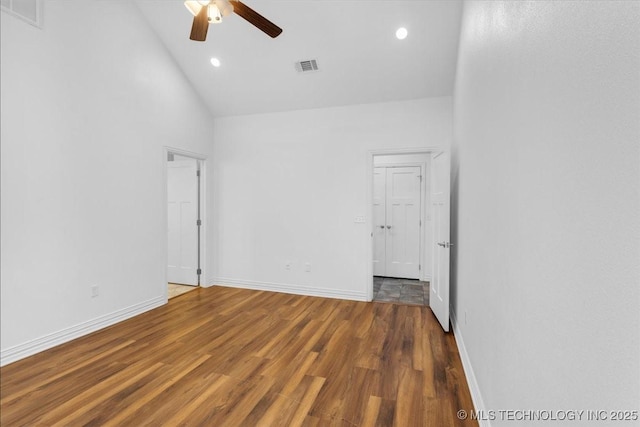 153 Founders Ln, Durant, OK 74701 - spare room with a ceiling fan, wood finished floors, baseboards, recessed lighting, and high vaulted ceiling