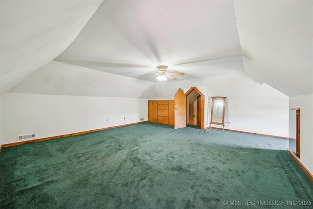 11029 N 3670th Rd, Okemah, OK 74884 - bonus room featuring vaulted ceiling, carpet, ceiling fan, and baseboards