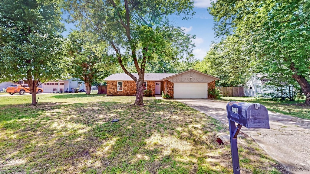 13808 S Dogwood St, Glenpool, OK 74033 - ranch-style house featuring driveway and an attached garage