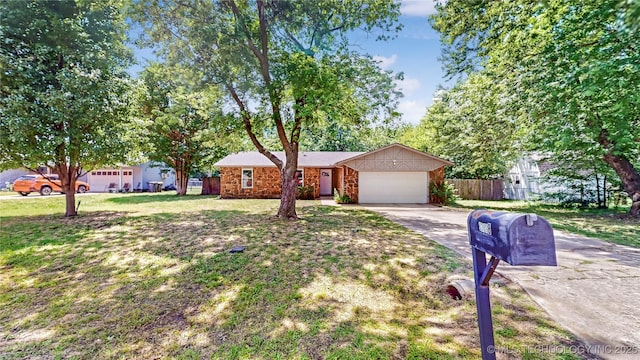 13808 S Dogwood St, Glenpool, OK 74033 - ranch-style house featuring driveway and an attached garage