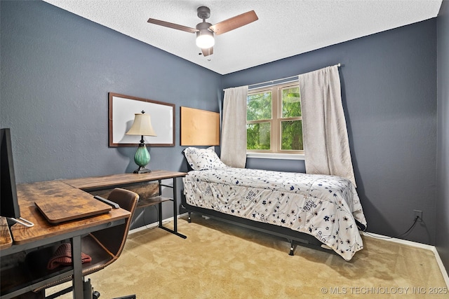 8313 Shadowood Ave, Broken Arrow, OK 74011 - bedroom featuring an office area, baseboards, carpet floors, a textured ceiling, and a textured wall