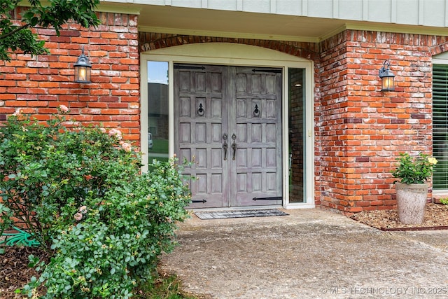 8313 Shadowood Ave, Broken Arrow, OK 74011 - view of exterior entry featuring brick siding