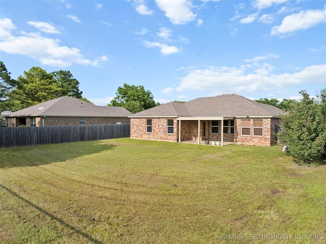 1204 Gantt, Marietta, OK 73448 - rear view of property with brick siding and a patio area