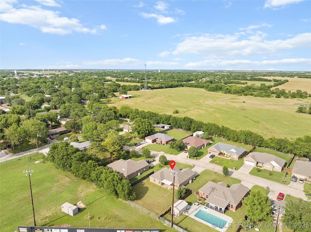 1204 Gantt, Marietta, OK 73448 - aerial view of property's location with a tree filled landscape and nearby suburban area