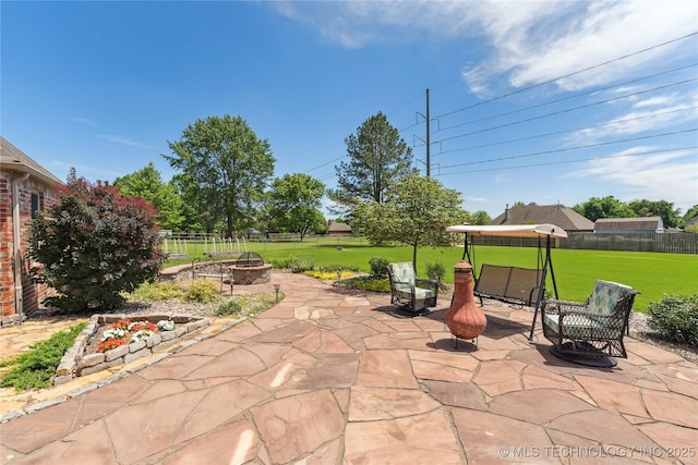 21542 E 103rd St S, Broken Arrow, OK 74014 - fenced backyard with an outdoor fire pit and a patio
