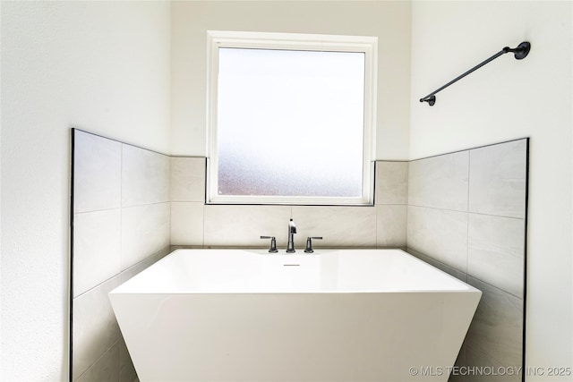 1404 E 149th Pl S, Glenpool, OK 74033 - bathroom with a freestanding tub