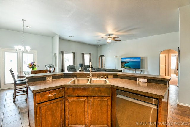 15610 E 91st St, Owasso, OK 74055 - kitchen with dishwasher, open floor plan, and dark countertops