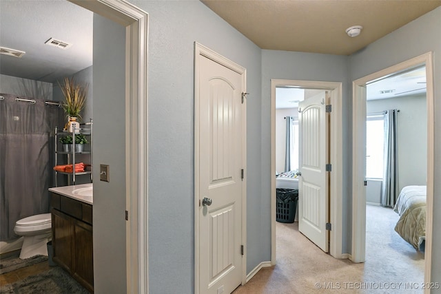 15610 E 91st St, Owasso, OK 74055 - hall with light carpet