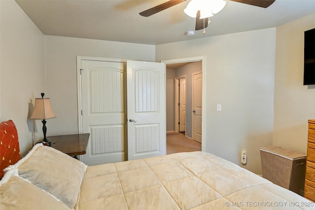 15610 E 91st St, Owasso, OK 74055 - bedroom with a closet and ceiling fan
