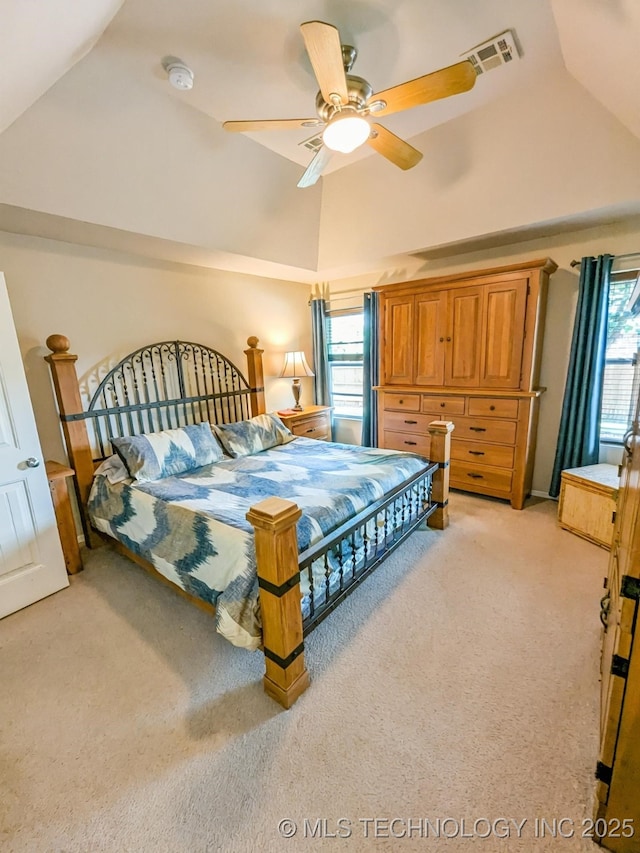 15610 E 91st St, Owasso, OK 74055 - bedroom featuring light carpet, high vaulted ceiling, and ceiling fan