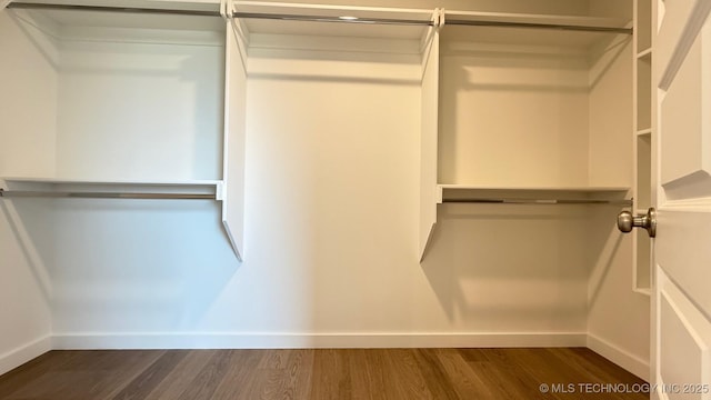 14984 S Oak St, Glenpool, OK 74033 - spacious closet with dark wood-type flooring