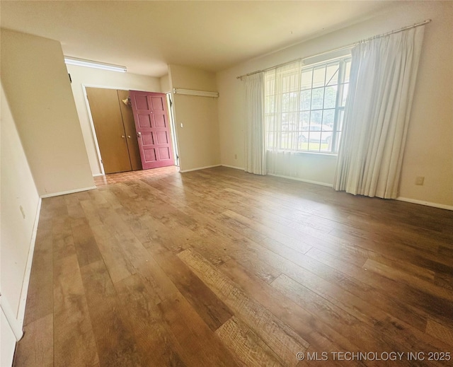 3405 S 85th E Ave, Tulsa, OK 74145 - unfurnished room with wood-type flooring and baseboards