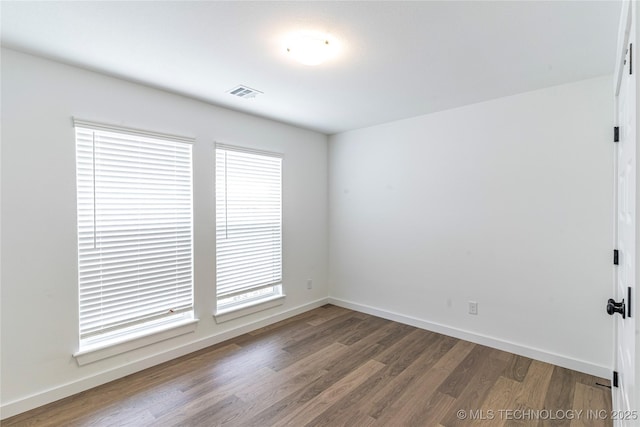 27790 E 109th Pl S, Coweta, OK 74429 - spare room with wood finished floors and baseboards
