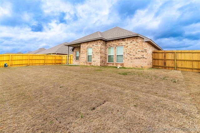 27790 E 109th Pl S, Coweta, OK 74429 - back of property featuring brick siding and a shingled roof