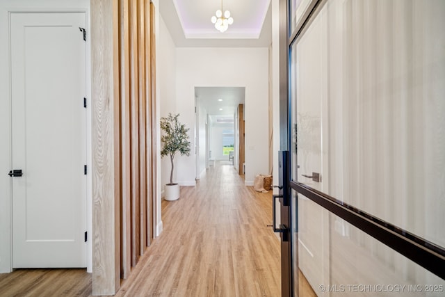 2357 E 134th Cir, Bixby, OK 74008 - corridor featuring light wood-type flooring and a raised ceiling